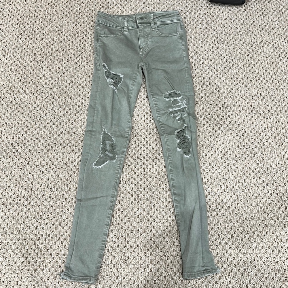American Eagle green distressed jeggings, women’s size 00